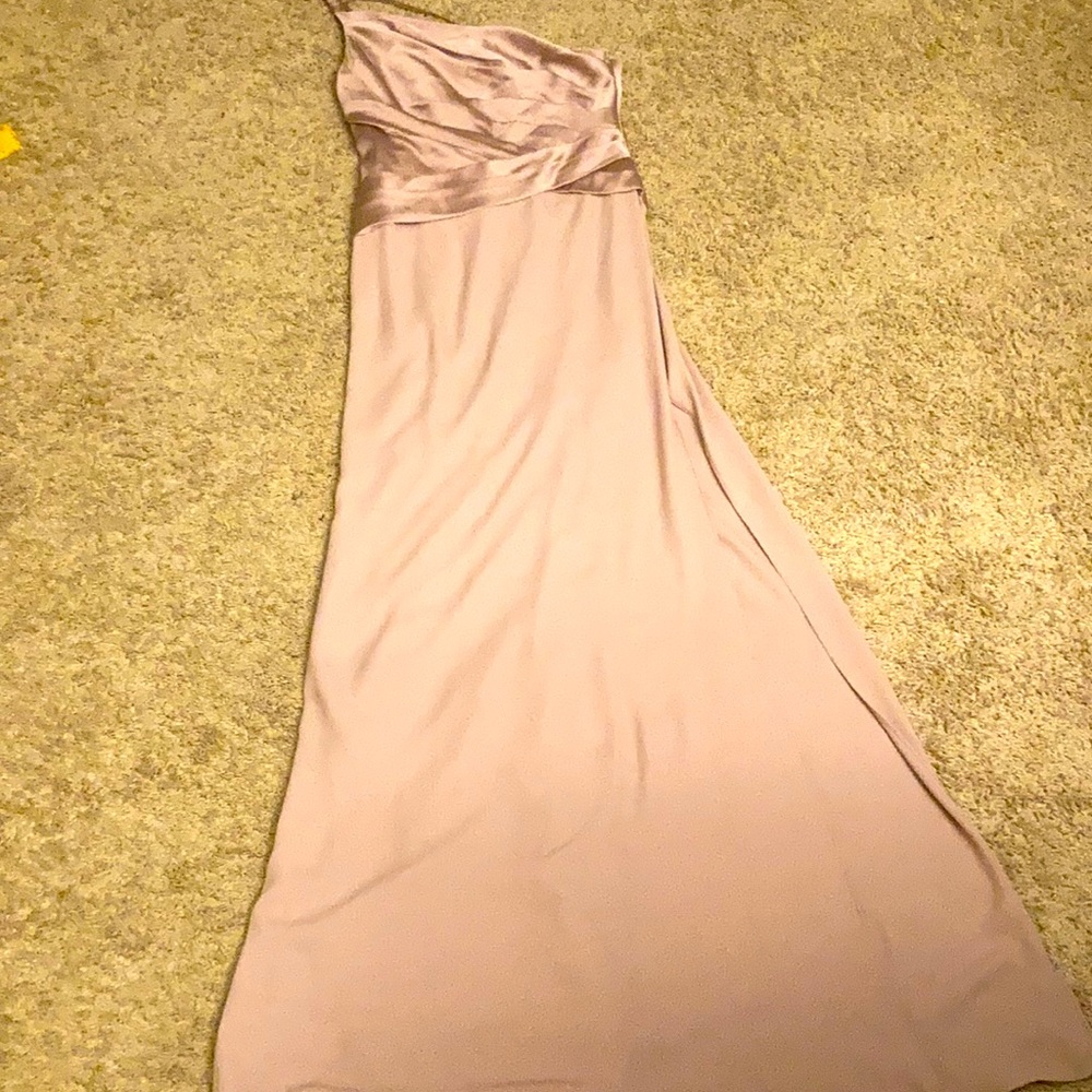 Stunning lilac bridesmaid dress new with tags never  won from David’s bridal .